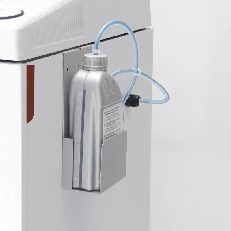 Réservoir de lubrification automatique sur un IDEAL 4005 SMC