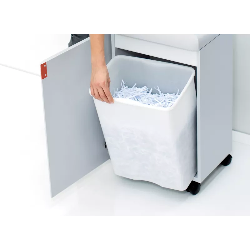 Extraction du réceptacle de papier de l’IDEAL 2445, porte ouverte