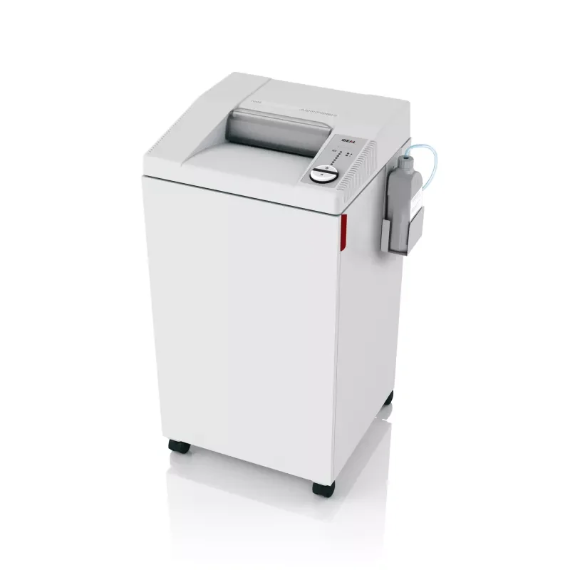 IDEAL 2604 équipé d’un huileur automatique : le réservoir externe est visible sur le côté.