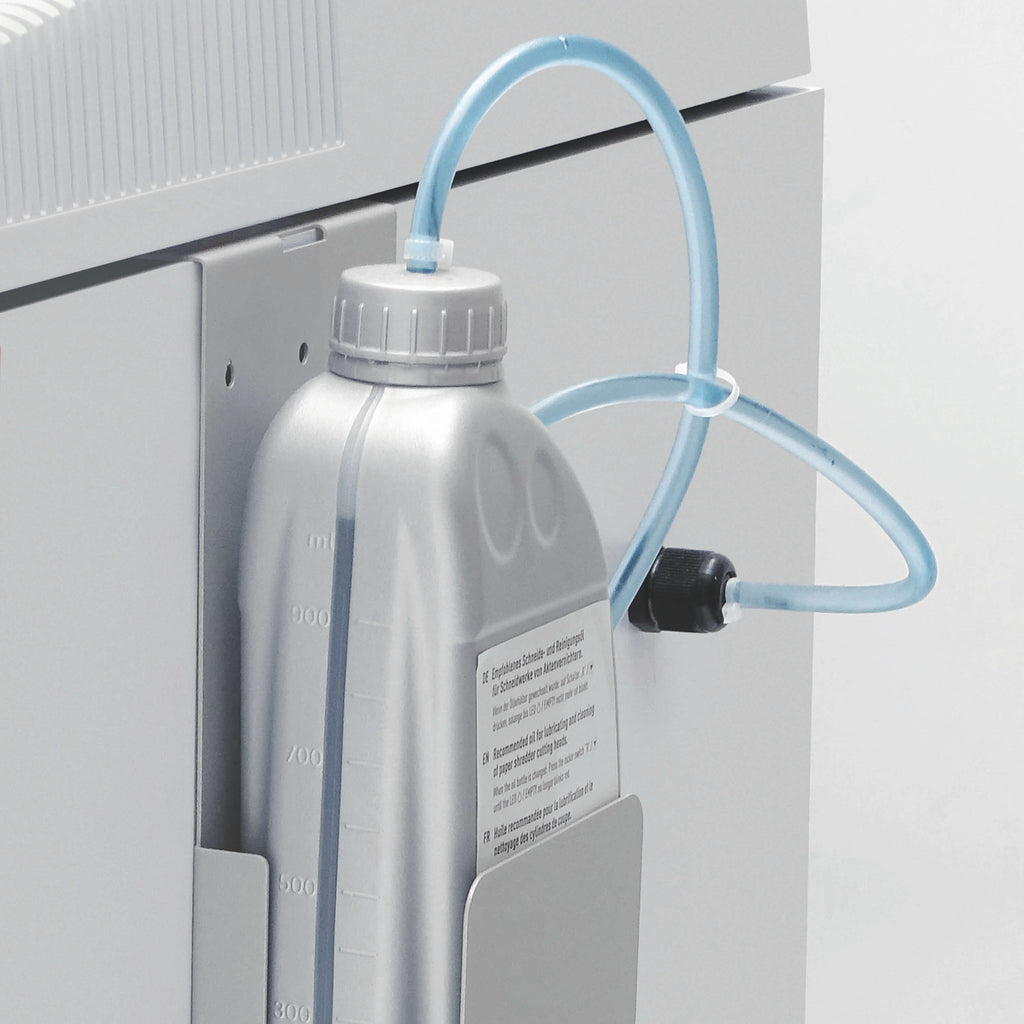 Photo du fabricant : IDEAL huile spéciale 1 litre 9000621, en place sur système automatique 2604–4005